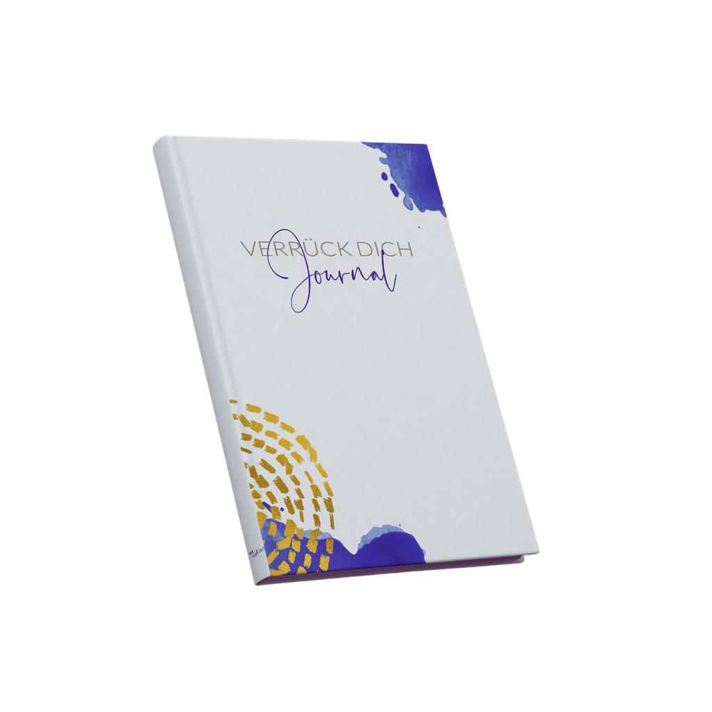 Notizbuch mit Hardcover, blauen Tintenklecksen, goldener Verzierung mit Aufschrift "Verrück Dich Journal"